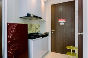Private kitchen - Restful And Comfortable Studio Transpark Bintaro Apartment (South Tangerang)
