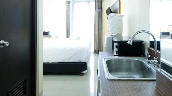 Individually decorated, individually furnished, free WiFi - Modern Studio (No Kitchen) At Tamansari Papilio Apartment (Surabaya)