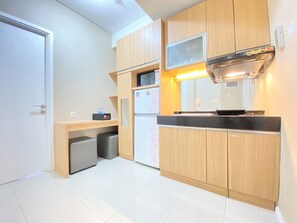 Private kitchen - Modest 2Br Apartment At Parahyangan Residence (Bandung)