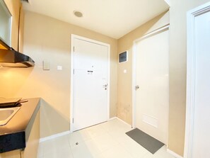 Apartment, 2 Bedrooms | Private kitchen | Fridge, stovetop, cookware/dishes/utensils, dining tables