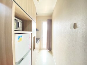 Apartment, 1 Bedroom | Private kitchen | Fridge, stovetop, cookware/dishes/utensils, dining tables - Cozy And Clean 1Br Apartment At Parahyangan Residence (Bandung)