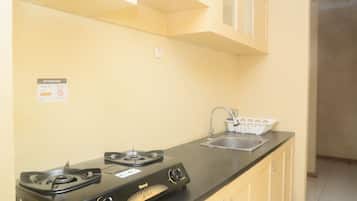 Apartemen, 2 kamar tidur | Dapur pribadi | Lemari es, kompor, peralatan masak/sendok-piring, dan meja makan