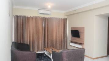 Apartment, 2 Bedrooms | Living area | TV