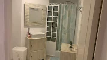 Shower, towels, soap, toilet paper