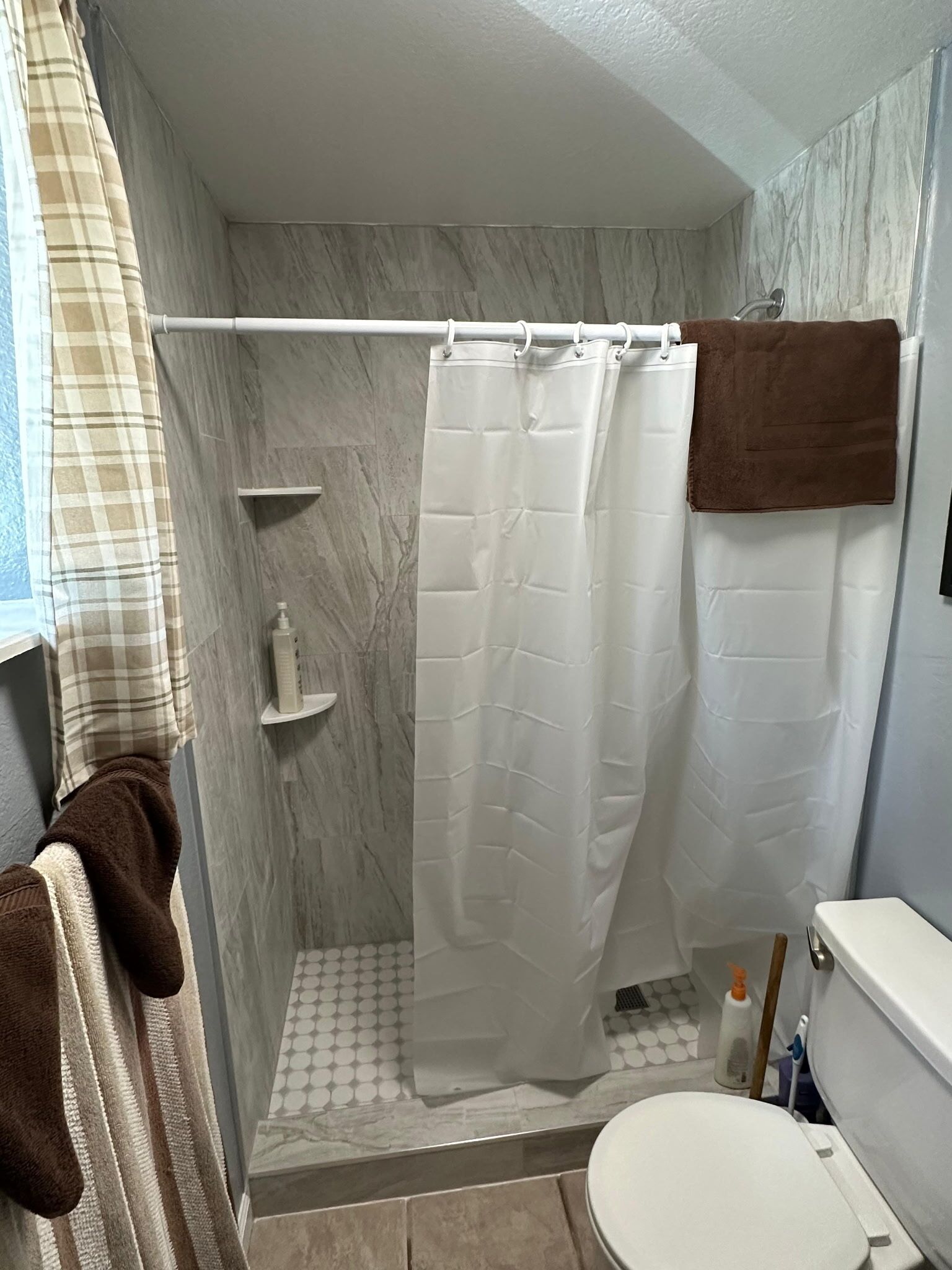 Shower, towels, soap, shampoo