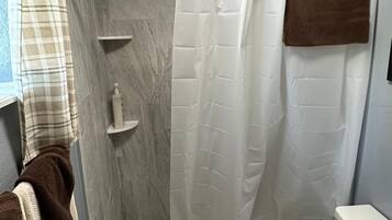 Shower, towels, soap, shampoo