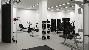 A gym with various exercise equipment, including dumbbells, treadmills, and weight machines. - Toivo Studios (Espoo)