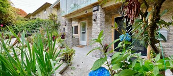Resort Style home living w/Hottub , outdoor shower and heated pool.