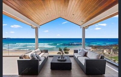Absolute Beachfront 4 bedroom luxury property Just 1 & 1/2 hrs south of Sydney