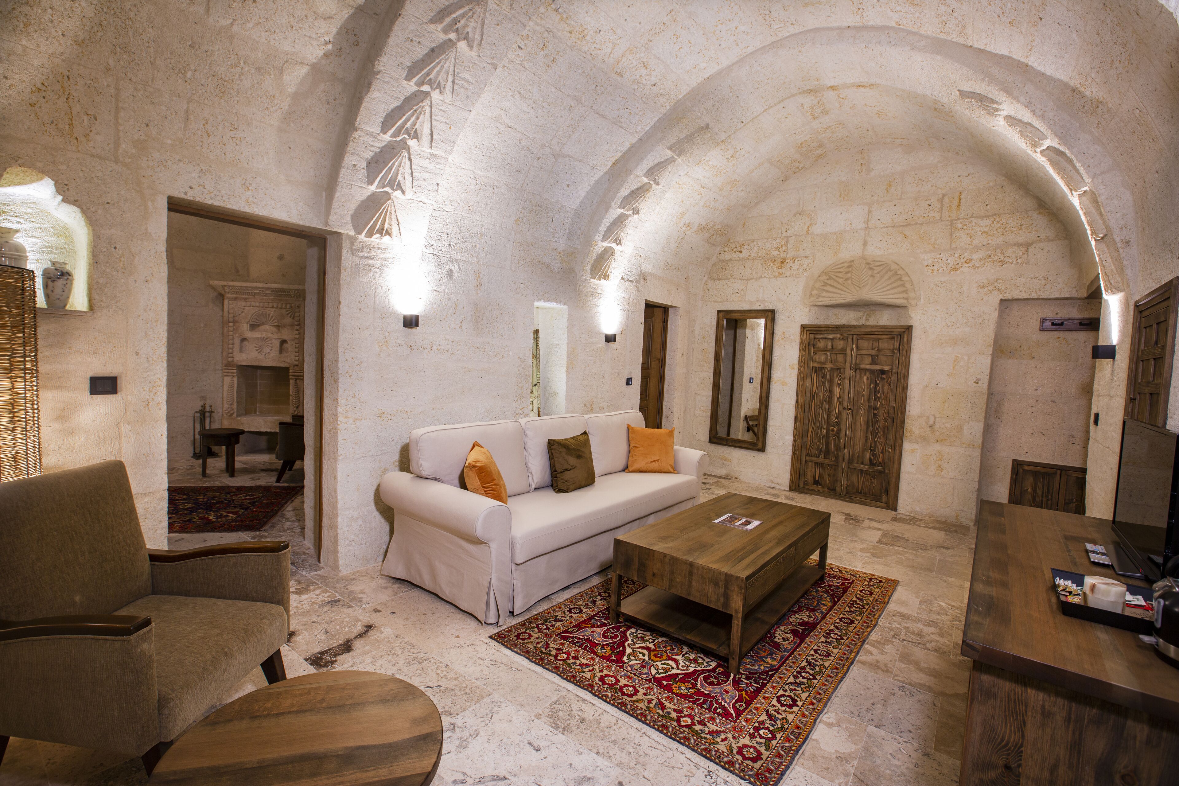 Premium Room | Living area | 42-inch LED TV with digital channels, TV, fireplace