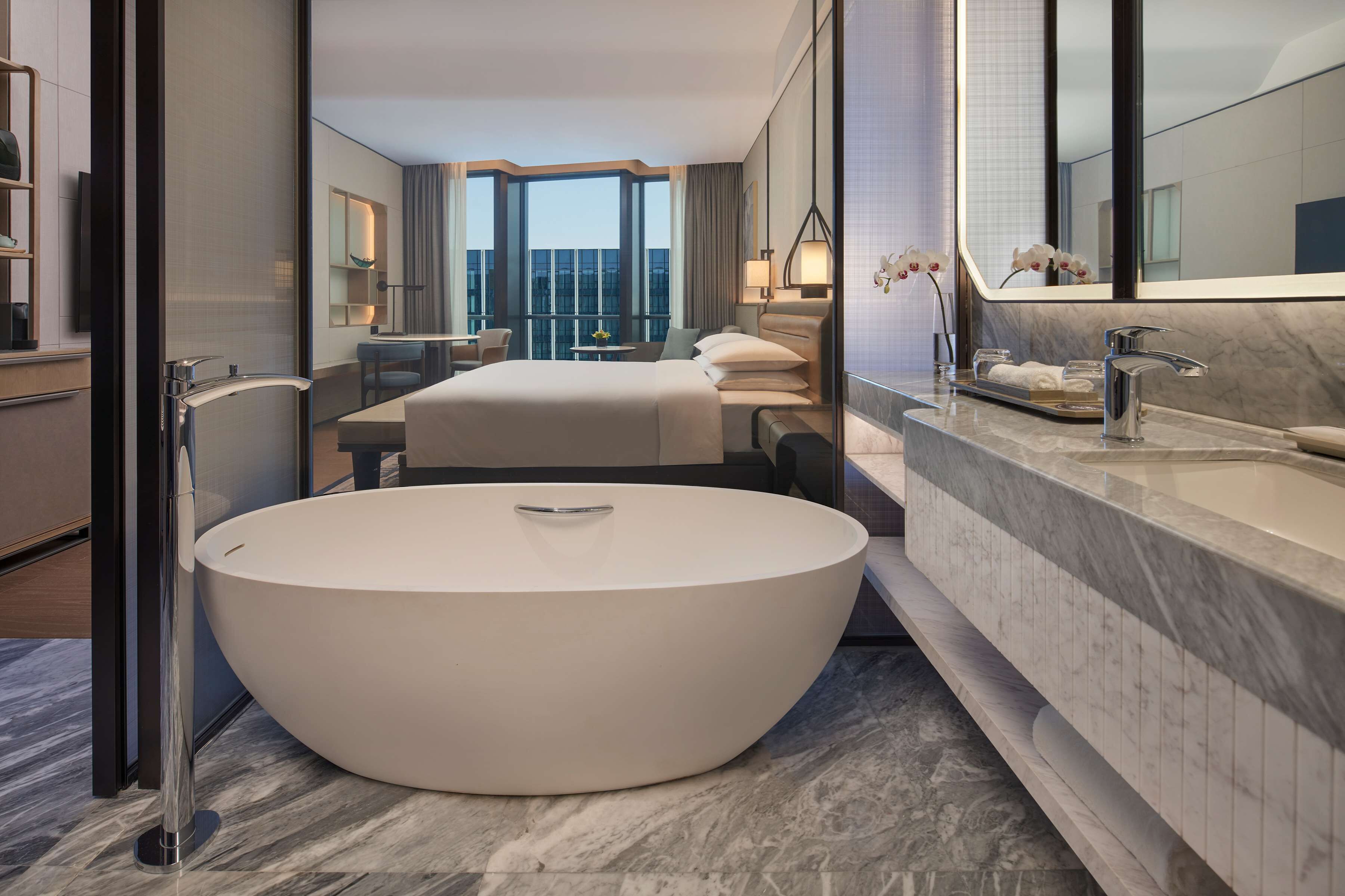regency suite | bathroom | rainfall showerhead, free toiletries, hair dryer, bathrobes