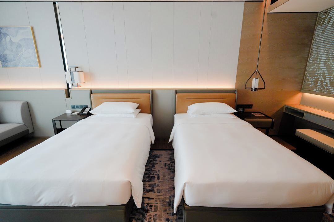 two twin beds | minibar, in-room safe, desk, blackout curtains