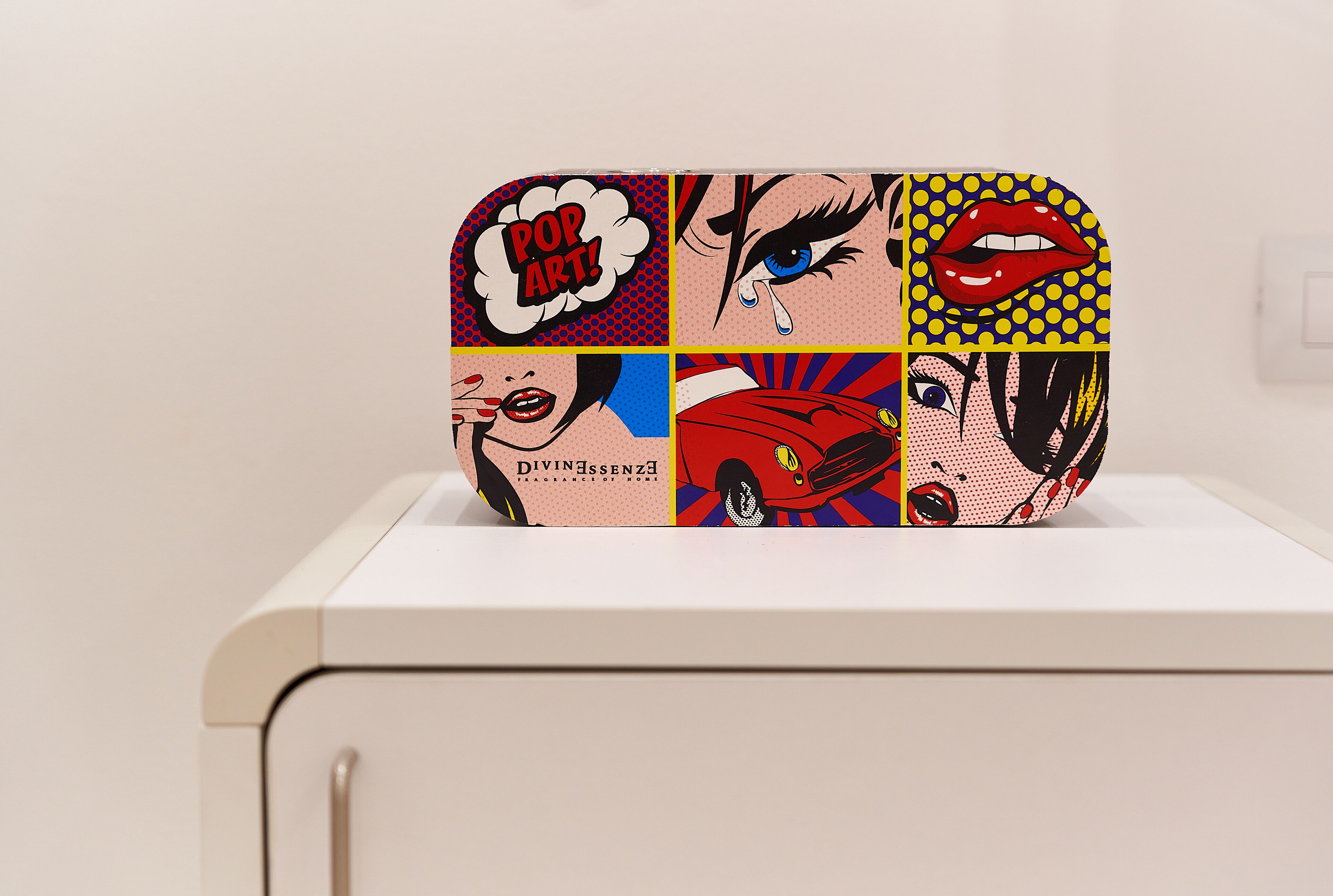 A pop art-inspired decorative piece on a white surface.