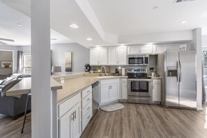 Condo, Multiple Beds, Balcony, Garden View (Brookside Retreat) | Private kitchen | Coffee/tea maker
