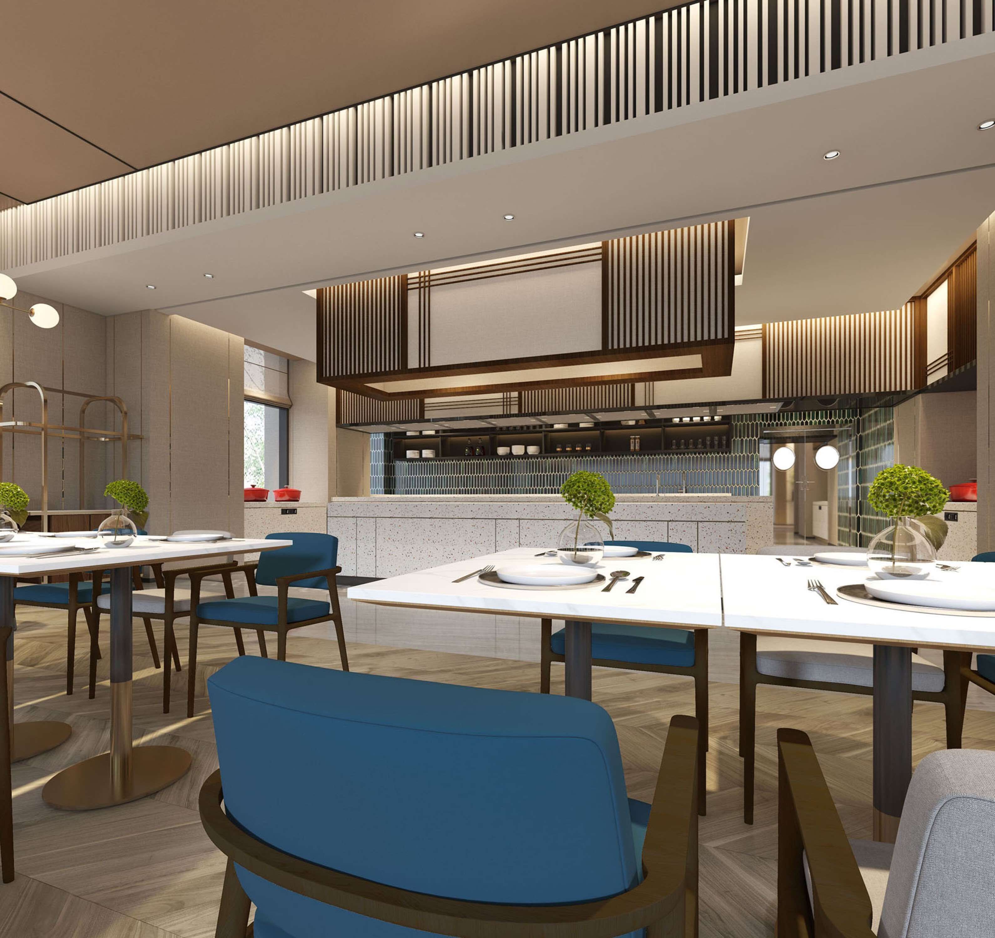 A modern dining area with multiple tables and chairs, a kitchen in the background, and a decorative ceiling.
