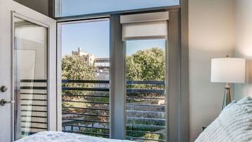 1 bedroom, desk, iron/ironing board, travel crib