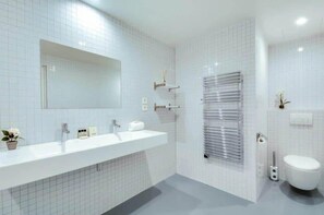Bathtub, hair dryer, towels
