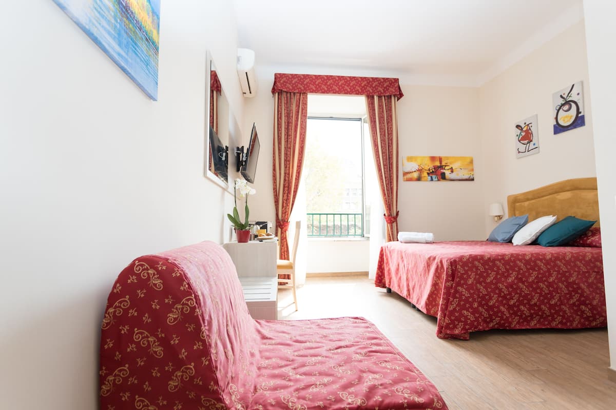 Family Triple Room | Memory-foam beds, in-room safe, desk, laptop workspace