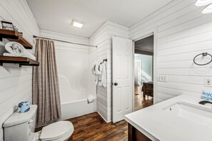 Combined shower/tub, hair dryer, towels, soap