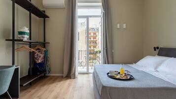 Quarto triplo | Camas com colchões de espuma com sistema de memória, cortinas blackout