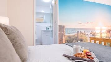 1 bedroom, laptop workspace, iron/ironing board, bed sheets