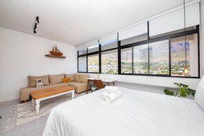 Basic Studio, 1 Queen Bed with Sofa bed | Laptop workspace, iron/ironing board, bed sheets - Boho Chic Studio Apartment in Cape Town (Cape Town)