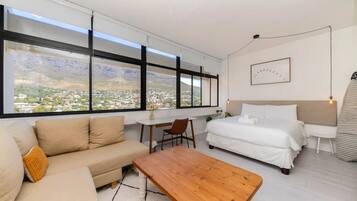 Basic Studio, 1 Queen Bed with Sofa bed | Laptop workspace, iron/ironing board, bed sheets