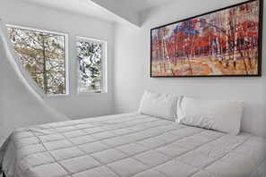 4 habitaciones, tabla de planchar con plancha y cuna de viaje 