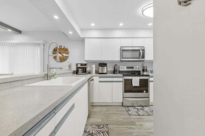 Fridge, microwave, oven, stovetop