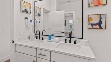 Bathtub, hair dryer, towels