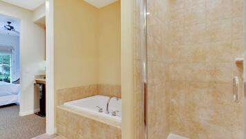 Bathtub, hair dryer, towels