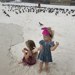 On the beach, sun-loungers