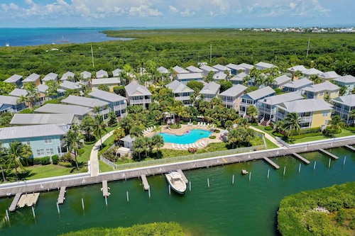 Beautiful Island Home in Anglers Reef! Ocean front community. Pool & boat slip. 