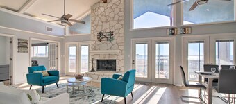 Sunny Lakefront Escape w/ Private Beach & Deck