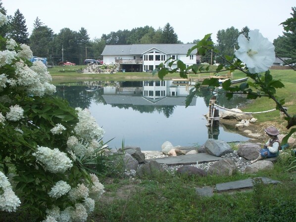 Property grounds - Building Memories & Relationships enjoy stocked pond, woods, game room, and more (Holland)