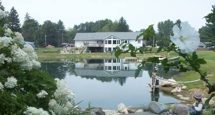 Building Memories & Relationships enjoy stocked pond, woods, game room, and more
