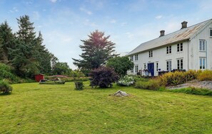 Escape to a serene retreat surrounded by lush gardens and tranquil surroundings.