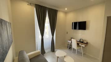 Junior Suite | Down comforters, in-room safe, individually decorated