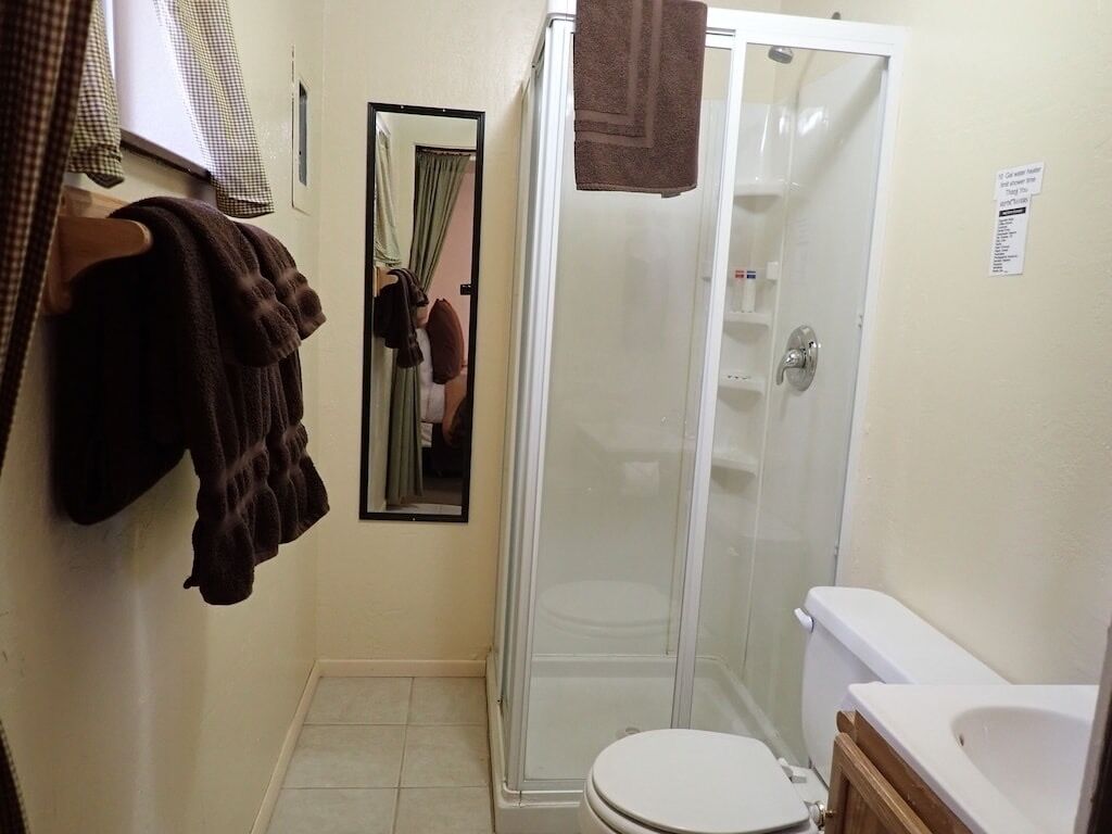 Bathtub, towels, soap, shampoo