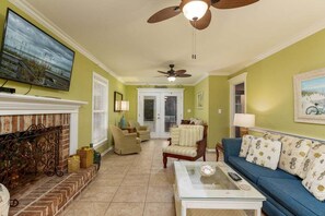 Smart TV, fireplace, books