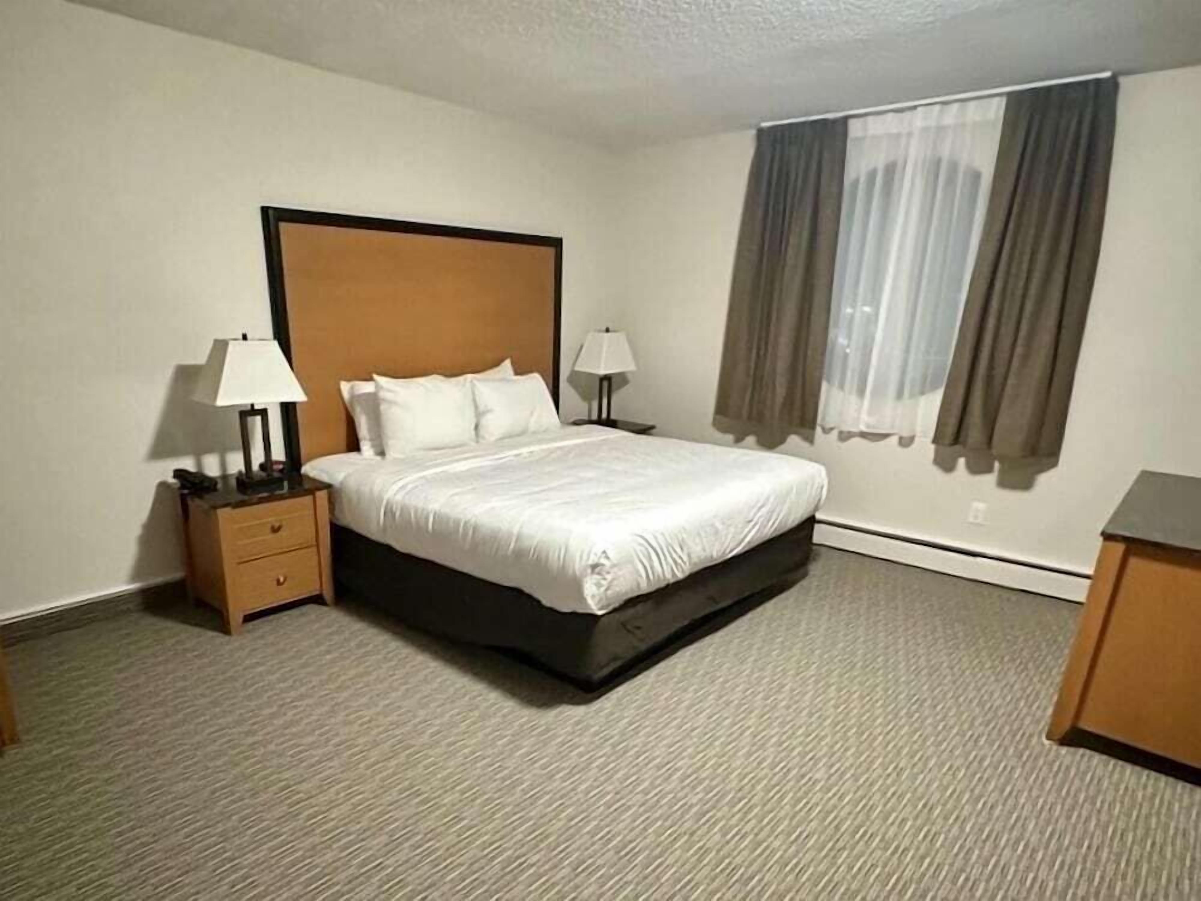 Premium bedding, pillowtop beds, blackout drapes, free WiFi