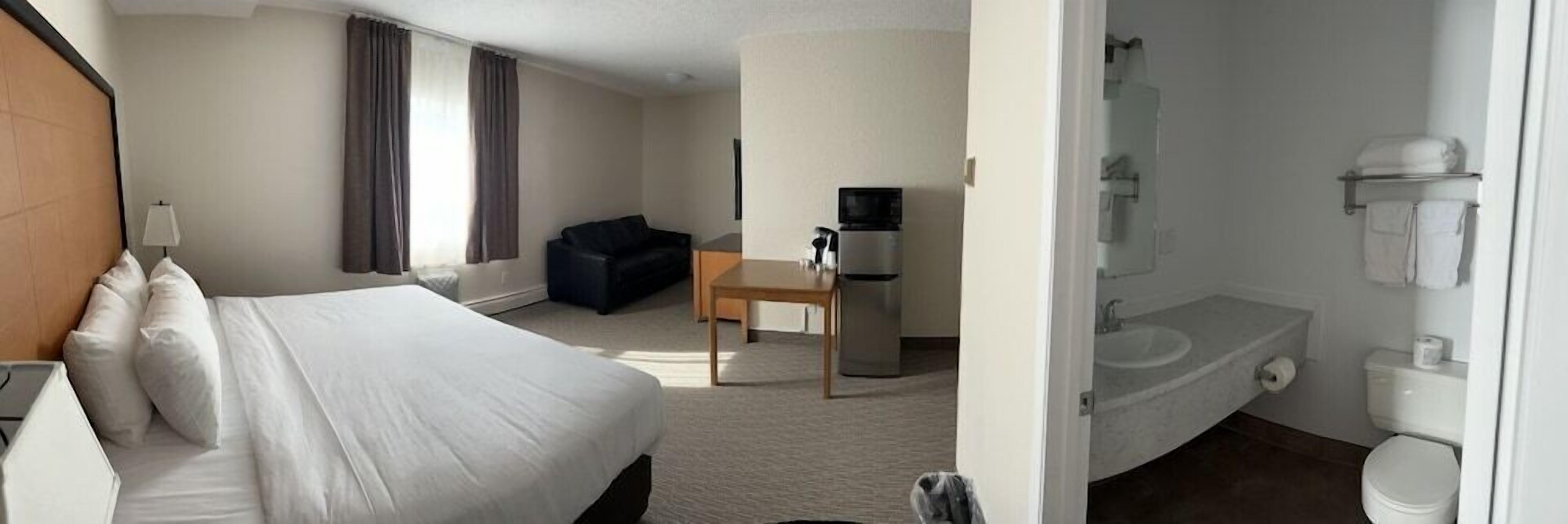 Premium bedding, pillowtop beds, blackout drapes, free WiFi