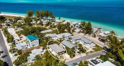 On Point: Across Street from Bean Point Beach, Outdoor Games & Pool by Anna Maria Life