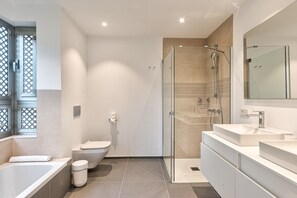 Bathtub, hair dryer, towels