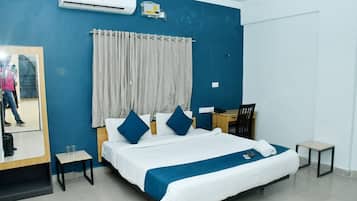 Desk, laptop workspace, free WiFi, bed sheets