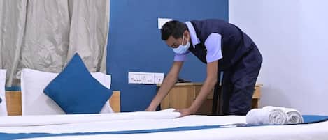 Desk, laptop workspace, free WiFi, bed sheets