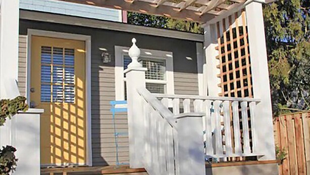 A house with a front porch, a wooden staircase, and a pergola. - Private, cozy, airy garden studio suite, for 1 or 2 guests (Portland)