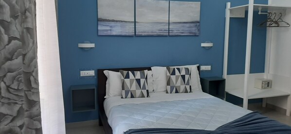 Couette en duvet d'oie, coffres-forts dans les chambres, bureau