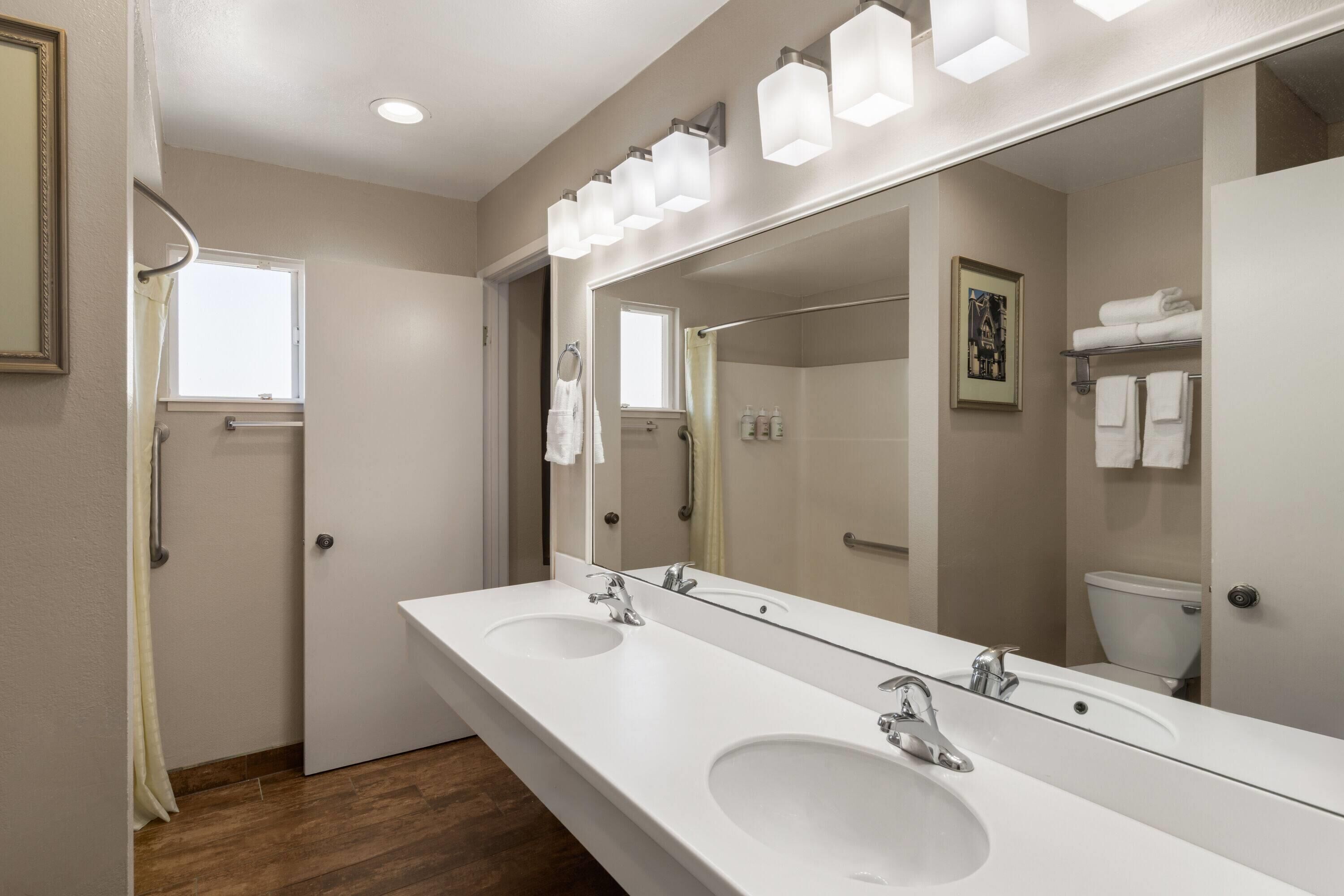 Suite, 2 Queen Beds, Non Smoking | Bathroom | Free toiletries, hair dryer, towels, soap