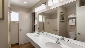 Suite, 2 Queen Beds, Non Smoking | Bathroom | Free toiletries, hair dryer, towels, soap